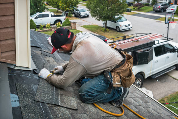 Professional Flat Roof Repair technician working in Pine Island, NY